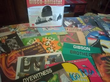 dischi  33 giri Lp + macchina lava dischi 