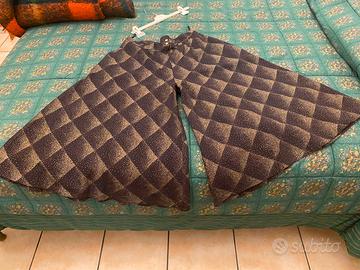 Gonna pantalone crespo e oro