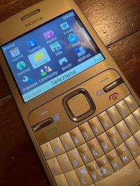 Telefono C3 oro e bianco funzionante.