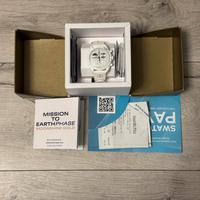 Swatch omega moonshine gold