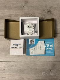 Swatch omega moonshine gold