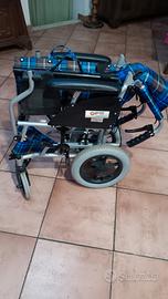 sedia a rotelle trasportina 