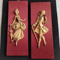 coppia di figurine in resina 