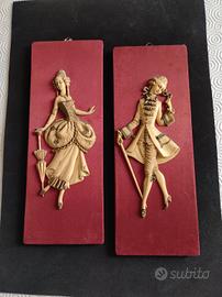 coppia di figurine in resina 
