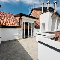 Appartamento mansardato con terrazzino