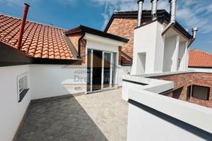 Appartamento mansardato con terrazzino