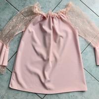 Maglia elegante con scollo a barca