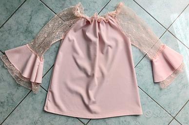 Maglia elegante con scollo a barca