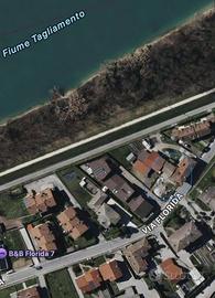 Porzione bifamiliare con giardino