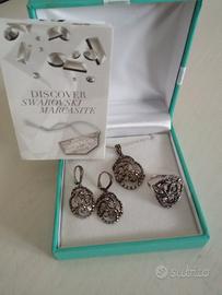 parure di gioielli Marc