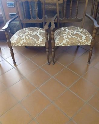 Coppia di antiche poltroncine in legno massello