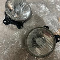 Copia fari anteriori Bosch originali per BMW E21