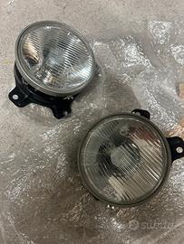 Copia fari anteriori Bosch originali per BMW E21