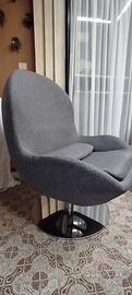 Poltrona in tessuto girevole