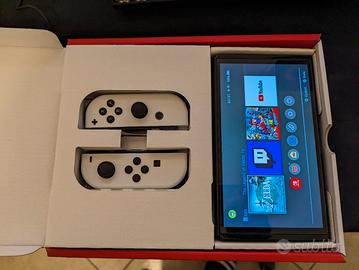 Switch OLED + accessori + giochi