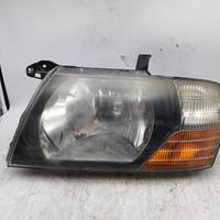 Faro ant sx MITSUBISHI PAJERO II '03