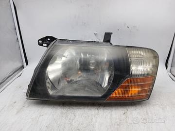 Faro ant sx MITSUBISHI PAJERO II '03