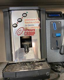 Macchina a cialde con gettoniera