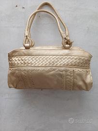 borsa in oro con due manici