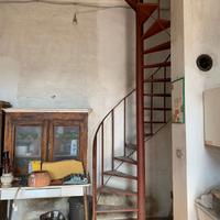 scala a chiocciola in ferro battuto