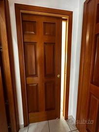 Porta scorrevole in legno massello