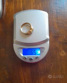 Anello in oro 18kt  750 con pietra centrale