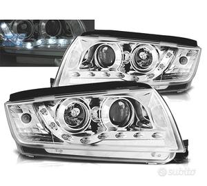 FARI SKODA FABIA 99-07 LUCE DIURNA LED FONDO CROMA