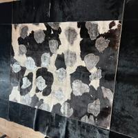 Tappeto in pelle di mucca patchwork