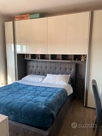 Armadio a ponte moderno con libreria