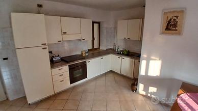 Casa accostata con terreno