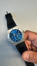 Orologio Memento sfondo blu