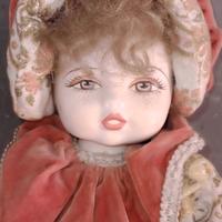 Stupenda bambola in porcellana