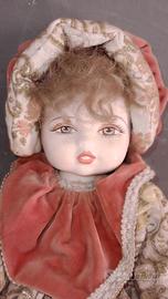 Stupenda bambola in porcellana