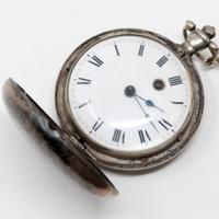 Antico orologio in argento