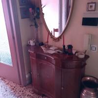 Mobile da ingresso con specchio