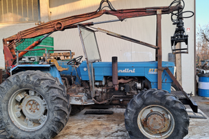 Trattore con ragno legna