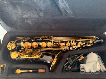 Sax alto ammon nero e dorato come NUOVO
