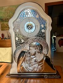 Orologio. Oggettistica religiosa e decorativa.