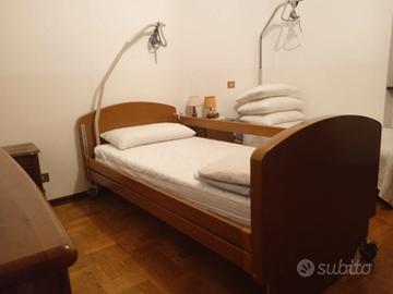 letto motorizzato con sponde e materasso 