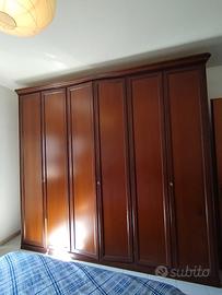 Armadio in legno a 6 ante