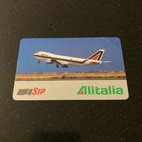 Scheda telefonica alitalia aereo in decollo