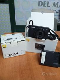 Nikon J1 con obiettivo 10mm
