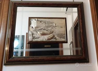 Quadro specchio con lastra d' argento in rilievo