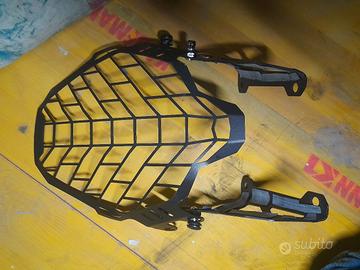 griglia copri faro suzuki v strom 