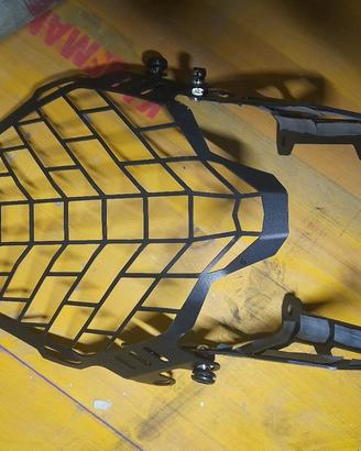 griglia copri faro suzuki v strom 