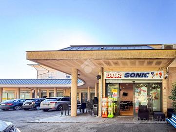 NEGOZIO A ROTTOFRENO