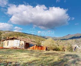 PODERE PANORAMICO VICINO A MARANO CON SOVRASTANTE