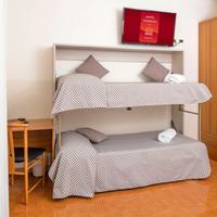 Letto a castello per 2 adulti a parete.