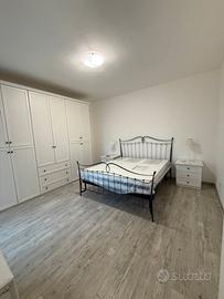 Camera con balcone privato vicino alla Ferrari