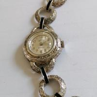 Vecchio orologio in argento da donna. 